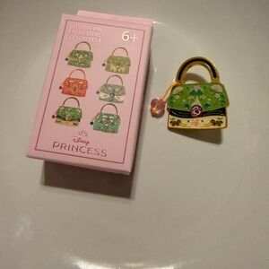 Disney Princess “Mulan” purse enamel mystery pin